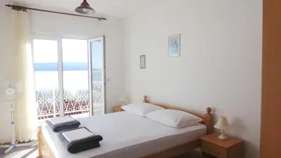 Krevet ili kreveti u jedinici u objektu Apartments by the sea Duce, Omis - 2829