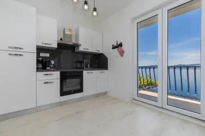 Kuhinja ili čajna kuhinja u objektu Apartments by the sea Pisak, Omis - 652