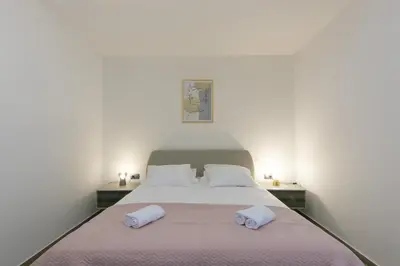 Krevet ili kreveti u jedinici u objektu Family friendly seaside apartments Brela - Makarska - 6007