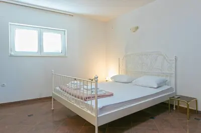 Krevet ili kreveti u jedinici u objektu Family friendly seaside apartments Brela - Makarska - 6007