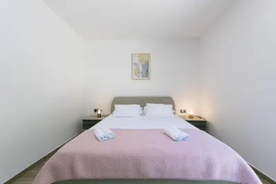 Krevet ili kreveti u jedinici u objektu Family friendly seaside apartments Brela - Makarska - 6007