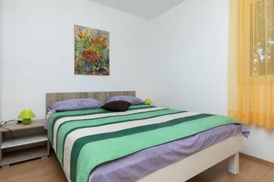 Krevet ili kreveti u jedinici u objektu Apartments with parking space Mimice, Omis - 2805