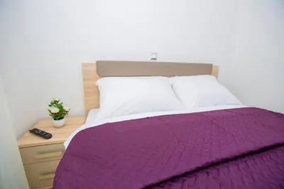 Krevet ili kreveti u jedinici u objektu Luxury Aparthotel