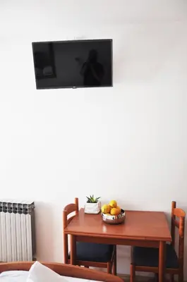 TV i/ili zabavni centar u objektu Sunrise Apartments and Studio Apartments