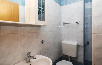 Kupaonica u objektu Sunrise Apartments and Studio Apartments