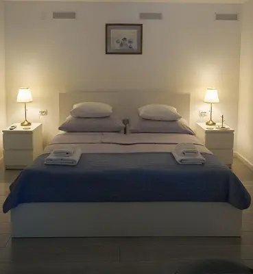 Krevet ili kreveti u jedinici u objektu Peaceful Old Town Apartment with Sea and Sunrise Views
