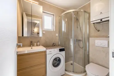 Kupaonica u objektu Bolotel Family & Studio Stay
