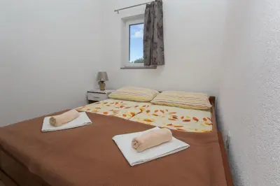 Krevet ili kreveti u jedinici u objektu Apartments with parking space Baska Voda, Makarska - 6761