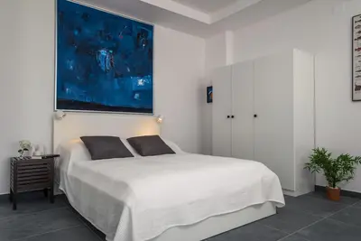 Krevet ili kreveti u jedinici u objektu Aqua residence