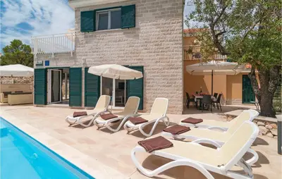 Bazen u objektu Holiday Home Postira With Sea View X ili u blizini