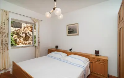 Krevet ili kreveti u jedinici u objektu Lovely Home In Pucisca With Jacuzzi