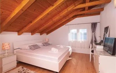 Krevet ili kreveti u jedinici u objektu Holiday Home Stanici With Sea View Xii