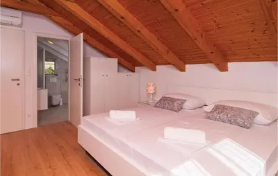 Krevet ili kreveti u jedinici u objektu Holiday Home Stanici With Sea View Xii
