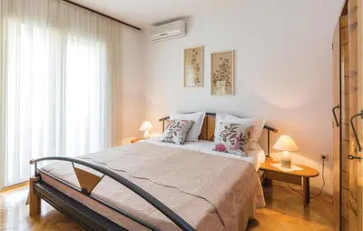Krevet ili kreveti u jedinici u objektu Apartment Makarska With Sea View 5