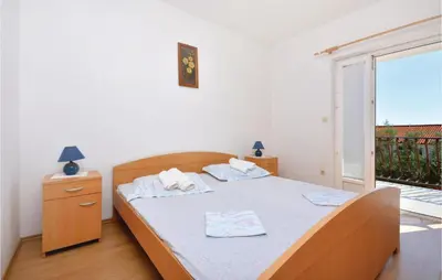 Krevet ili kreveti u jedinici u objektu Apartment Ivan Dolac With Sea View X
