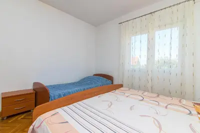 Krevet ili kreveti u jedinici u objektu Apartment Jerka