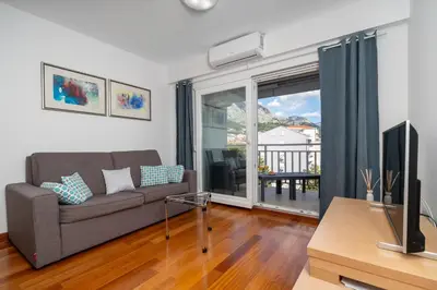TV i/ili zabavni centar u objektu Beachfront Apartment Mlinarevic