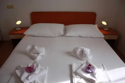Krevet ili kreveti u jedinici u objektu Villa dvor apartments