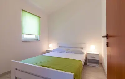 Krevet ili kreveti u jedinici u objektu Apartments Ana