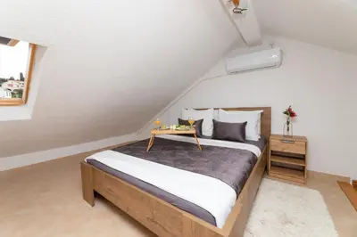 Krevet ili kreveti u jedinici u objektu Apartments Tino