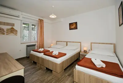 Krevet ili kreveti u jedinici u objektu Guesthouse Aurora