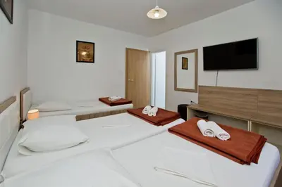 Krevet ili kreveti u jedinici u objektu Guesthouse Aurora