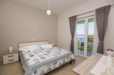 Krevet ili kreveti u jedinici u objektu Sea View Apartment Gin Brela