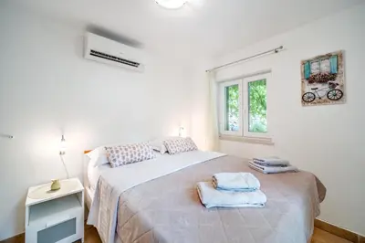 Krevet ili kreveti u jedinici u objektu Holiday Home Sarbunara