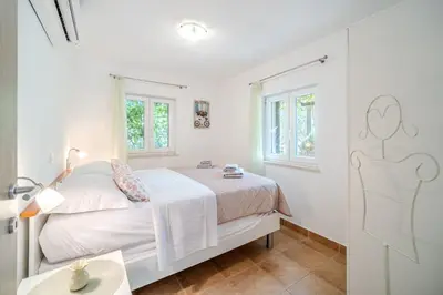 Krevet ili kreveti u jedinici u objektu Holiday Home Sarbunara