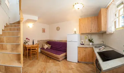 Kuhinja ili čajna kuhinja u objektu Beach Resort Apartments Podspiline