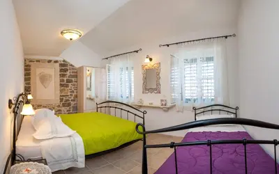 Krevet ili kreveti u jedinici u objektu Beach Resort Apartments Podspiline