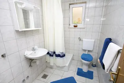 Kupaonica u objektu Apartments with a parking space Podstrana, Split - 4849