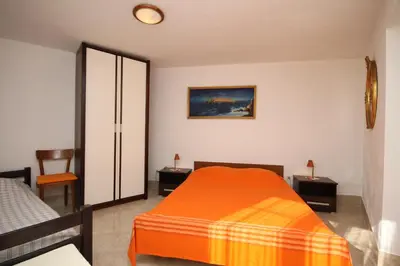Krevet ili kreveti u jedinici u objektu Apartments by the sea Marusici, Omis - 8632