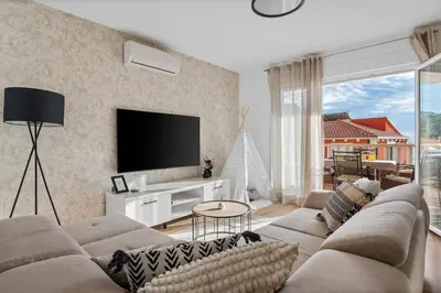 TV i/ili zabavni centar u objektu Apartments Bakota