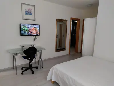 TV i/ili zabavni centar u objektu Magi House with pool