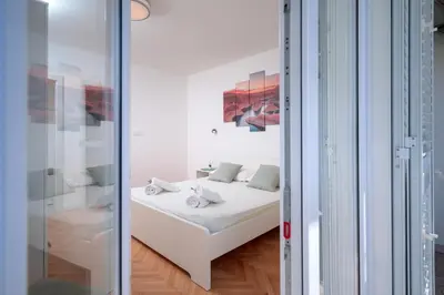 Krevet ili kreveti u jedinici u objektu Apartments Lucic