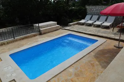 Bazen u objektu Seaside apartments with a swimming pool Supetar, Brac - 11360 ili u blizini