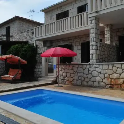 Seaside apartments with a swimming pool Supetar