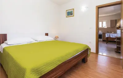 Krevet ili kreveti u jedinici u objektu Holiday Home Povlja With Sea View I