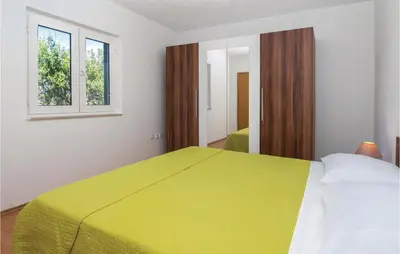 Krevet ili kreveti u jedinici u objektu Holiday Home Povlja With Sea View I