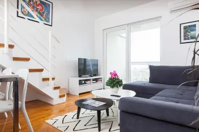 TV i/ili zabavni centar u objektu New Gallery Apartment with Beautiful View