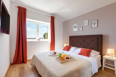 Krevet ili kreveti u jedinici u objektu Apartments Solmar
