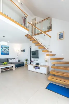 TV i/ili zabavni centar u objektu Villa Blue Sky