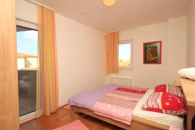 Krevet ili kreveti u jedinici u objektu Apartments with a parking space Makarska - 3751