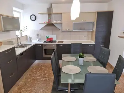 Kuhinja ili čajna kuhinja u objektu Apartments by the sea Postira, Brac - 706
