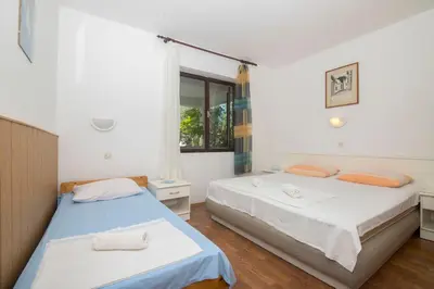 Krevet ili kreveti u jedinici u objektu Apartments Tonin