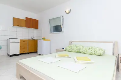 Krevet ili kreveti u jedinici u objektu Apartments Laguna