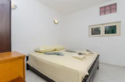Krevet ili kreveti u jedinici u objektu Apartments Laguna