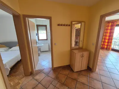 Krevet ili kreveti u jedinici u objektu Apartments and Rooms Mamić