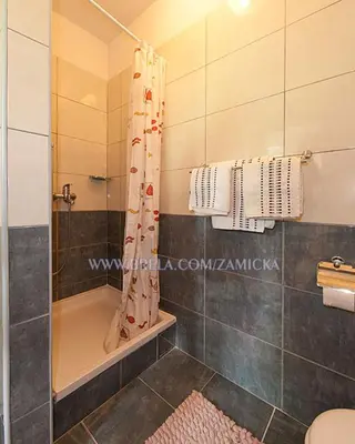 Kupaonica u objektu Apartments Zamicka